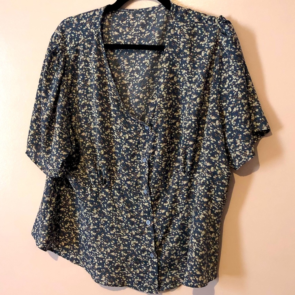 Light blue floral peplum plus size top
